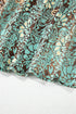 Green Floral Print V Neck Ruffled Trim Backless Tassel Waist Maxi Dress